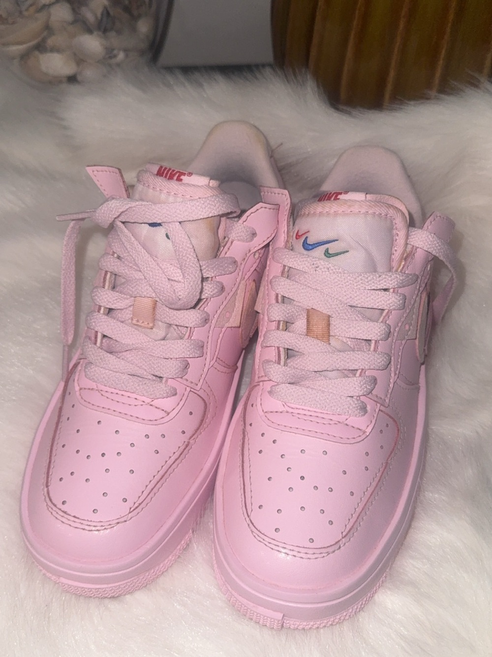Nike Pink Low-Top Sneakers with Multicolor Swoosh Detail